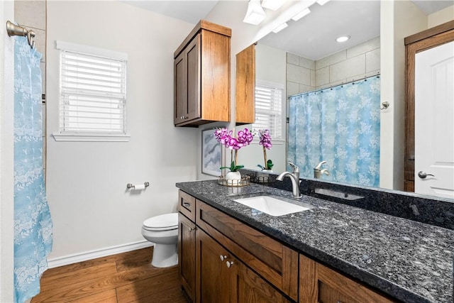 2718 Yeager Dr, Corpus Christi, TX 78410 - full bath with vanity, wood finished floors, and curtained shower