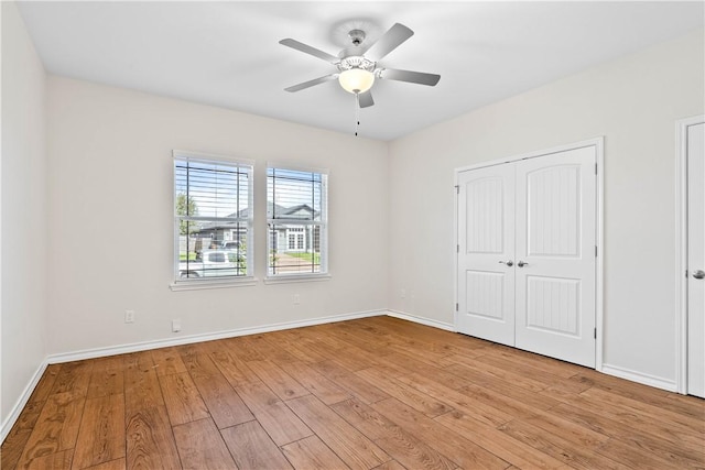 2718 Yeager Dr, Corpus Christi, TX 78410 - unfurnished bedroom featuring light wood-style floors, a closet, and a ceiling fan