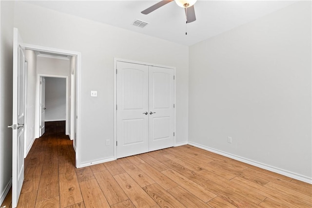 2718 Yeager Dr, Corpus Christi, TX 78410 - unfurnished bedroom featuring light wood-type flooring, a closet, and ceiling fan