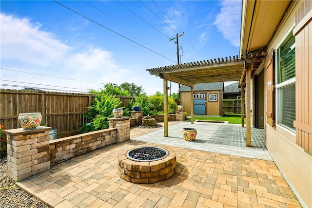 2718 Yeager Dr, Corpus Christi, TX 78410 - fenced backyard with a patio area, a storage shed, an outdoor fire pit, and a pergola