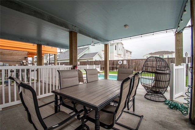 view of patio / terrace featuring a fenced in pool