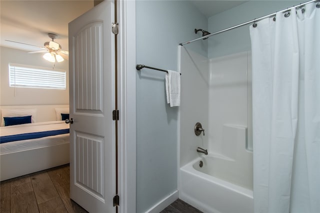 bathroom with shower / bath combo, hardwood / wood-style floors, and ceiling fan