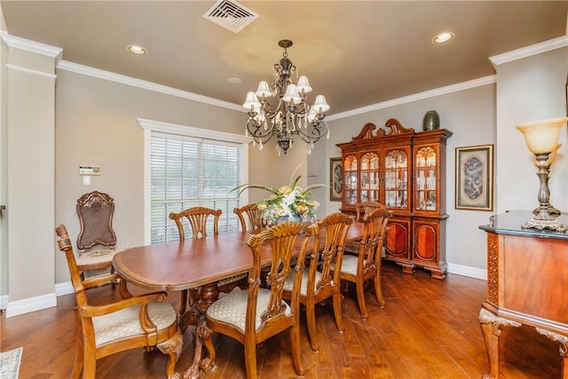 5030 S Oso Pkwy, Corpus Christi, TX 78413 - dining room with a chandelier, dark wood-type flooring, ornamental molding, and recessed lighting