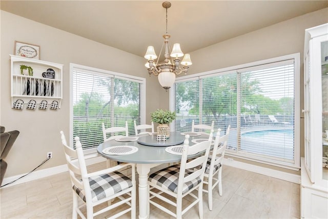 5030 S Oso Pkwy, Corpus Christi, TX 78413 - dining space with a chandelier and baseboards