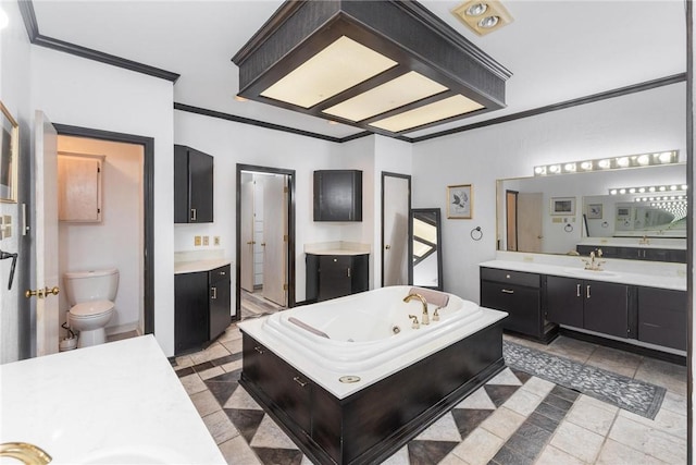 8018 Saint Laurent Dr, Corpus Christi, TX 78414 - full bath with crown molding, two vanities, a tub with jets, and toilet