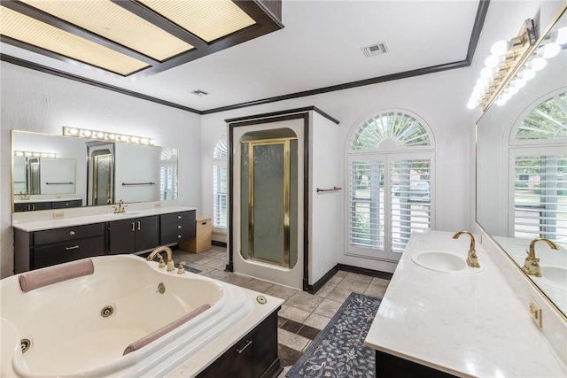 8018 Saint Laurent Dr, Corpus Christi, TX 78414 - bathroom with healthy amount of natural light, crown molding, a stall shower, a tub with jets, and two vanities