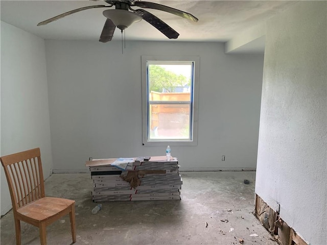 interior space featuring ceiling fan