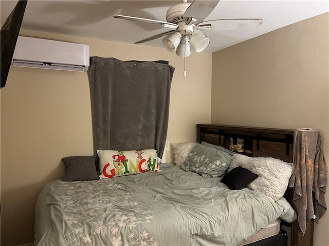 bedroom featuring a wall unit AC and ceiling fan