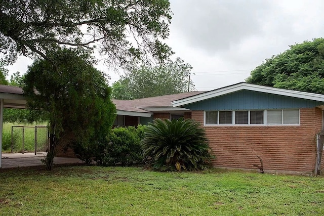 view of property exterior featuring a yard