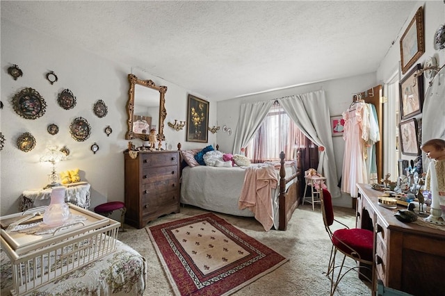 carpeted bedroom with a textured ceiling