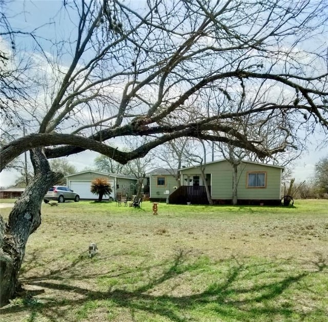 view of yard with a garage