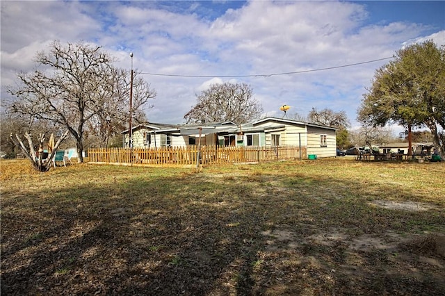 exterior space with a front lawn