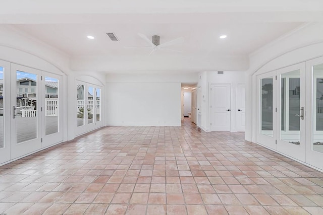 1895 Bay Shore Dr, Rockport, TX 78382 - empty room with visible vents, a ceiling fan, recessed lighting, and light tile patterned floors
