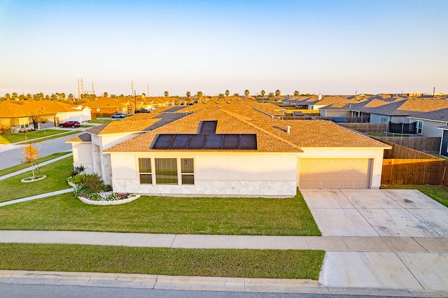 view of front of home with a lawn