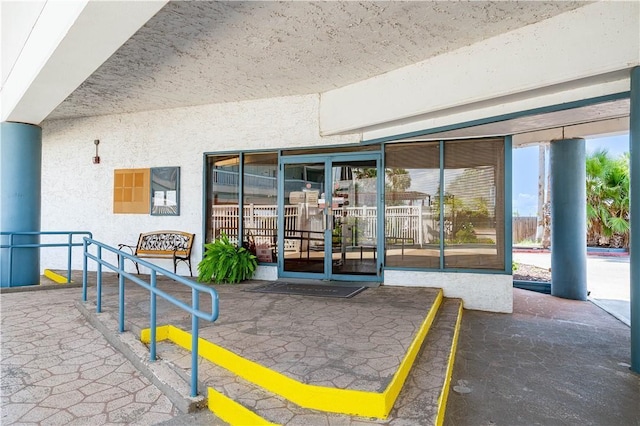 3938 Surfside Blvd Unit 3344, Corpus Christi, TX 78402 - view of exterior entry featuring stucco siding