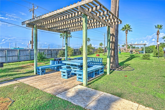 exterior space featuring a yard and a pergola