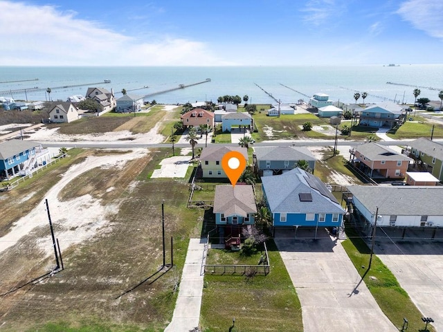 aerial view with a residential view and a water view