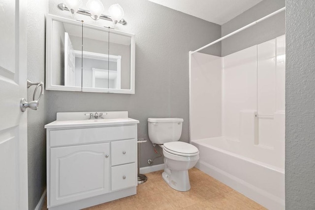 bathroom with shower / tub combination, tile patterned flooring, toilet, vanity, and baseboards