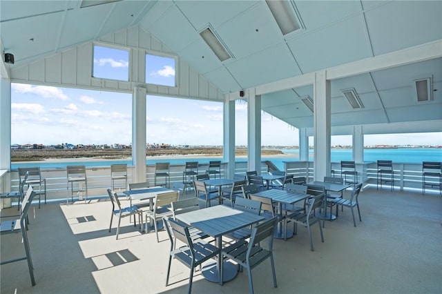 view of patio with a water view