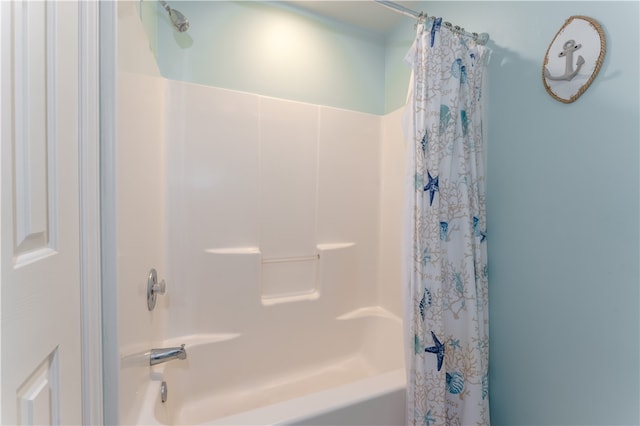 bathroom with shower / tub combo