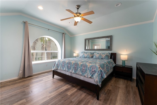 bedroom with hardwood / wood-style floors, ceiling fan, and vaulted ceiling