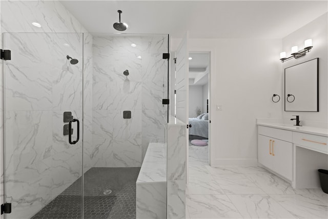 bathroom with an enclosed shower and vanity