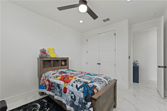 bedroom with a closet and ceiling fan