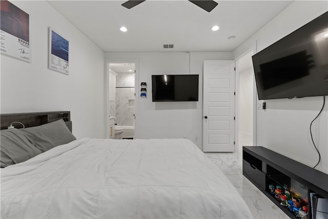 bedroom featuring ensuite bath and ceiling fan