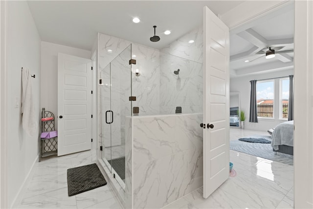 bathroom featuring an enclosed shower and ceiling fan