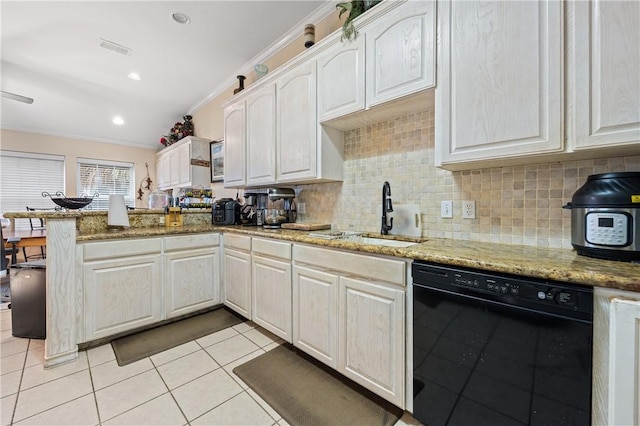 kitchen featuring crown molding, white cabinets, light stone countertops, and black dishwasher