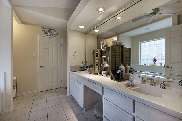 bathroom featuring tile patterned flooring, vanity, and ceiling fan