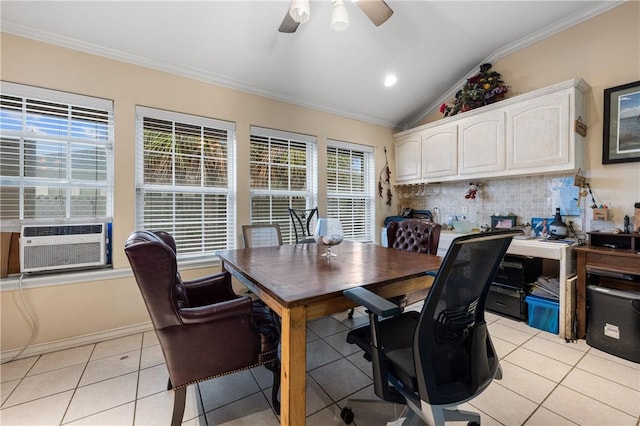 tiled dining room featuring vaulted ceiling, cooling unit, crown molding, and ceiling fan