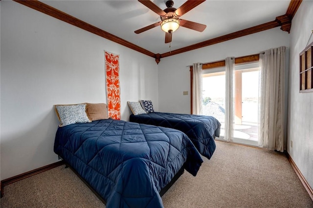 carpeted bedroom with ceiling fan and crown molding