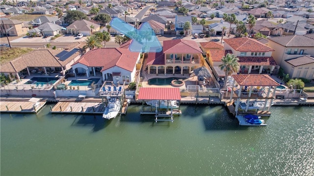 drone / aerial view featuring a water view