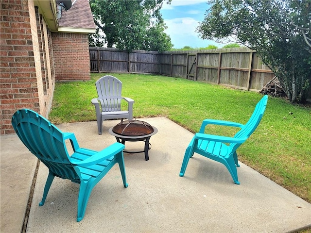 2022 Jenica Dr, Ingleside, TX 78362 - view of patio / terrace featuring a fire pit