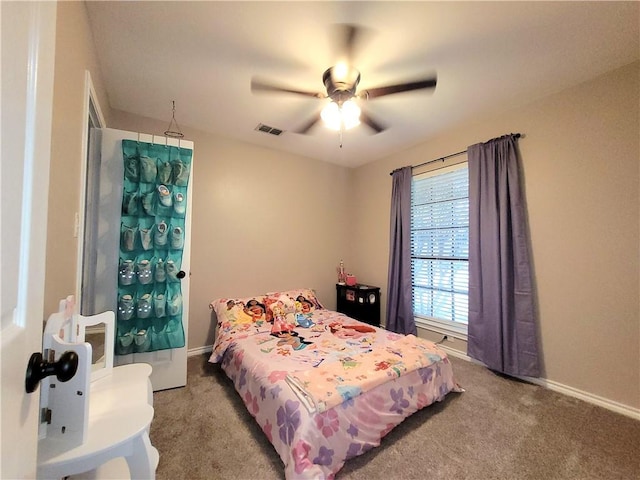 2022 Jenica Dr, Ingleside, TX 78362 - carpeted bedroom with baseboards and ceiling fan