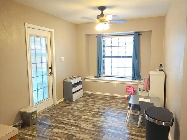 2022 Jenica Dr, Ingleside, TX 78362 - interior space with dark wood finished floors, a ceiling fan, and plenty of natural light