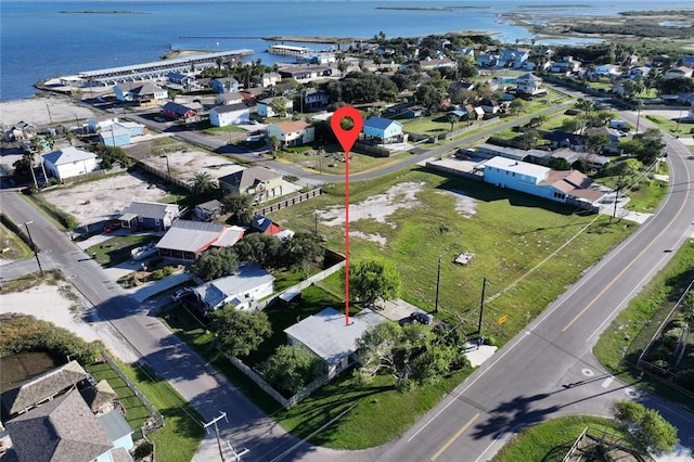 4049 Laguna Shrs, Corpus Christi, TX 78418 - aerial view of property and surrounding area featuring a large body of water and nearby suburban area