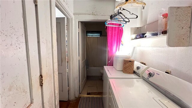 4049 Laguna Shrs, Corpus Christi, TX 78418 - laundry area featuring independent washer and dryer