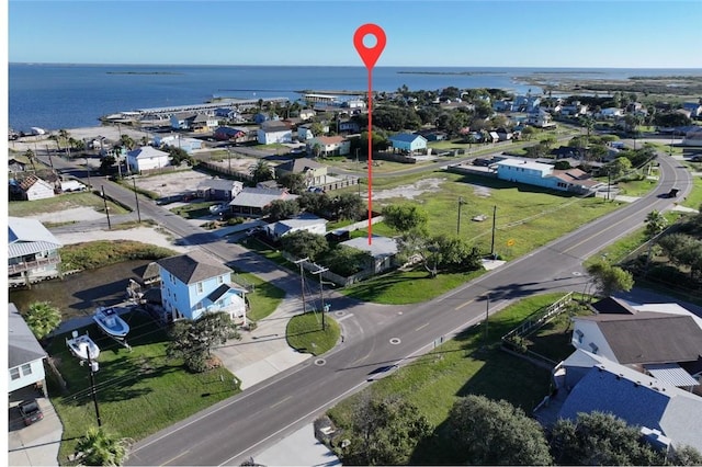 4049 Laguna Shrs, Corpus Christi, TX 78418 - aerial perspective of suburban area with a large body of water