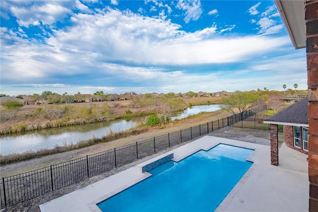 view of pool with a fenced in pool, a water view, a fenced backyard, and a patio area