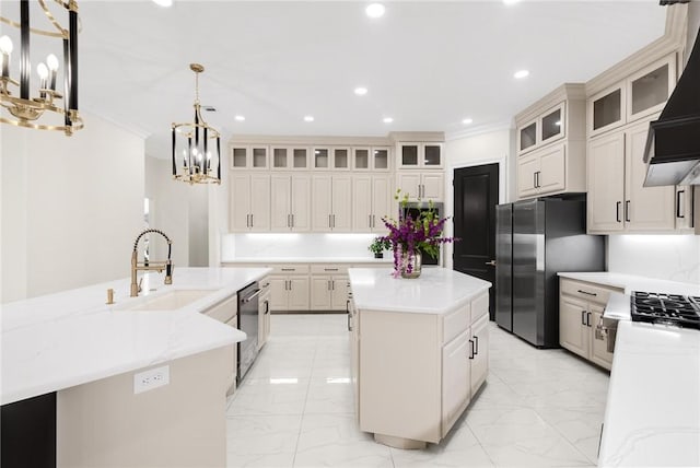 kitchen featuring a sink, a kitchen island with sink, marble finish floor, and stainless steel appliances