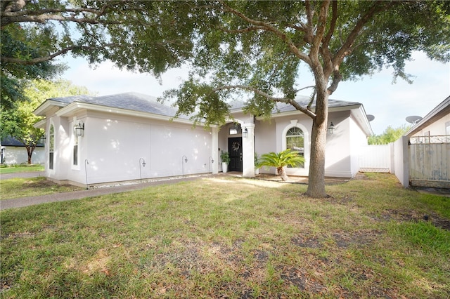 view of front of property with a front lawn