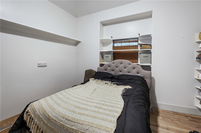 bedroom with light hardwood / wood-style flooring