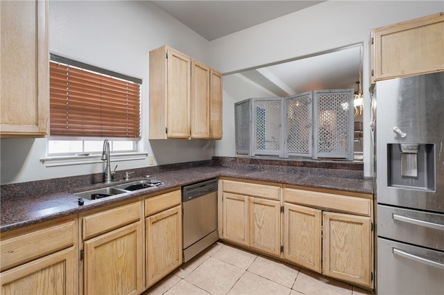 kitchen featuring light brown cabinets, appliances with stainless steel finishes, sink, and light tile patterned floors