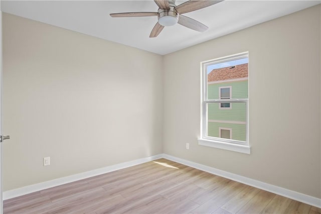 unfurnished room featuring ceiling fan and light hardwood / wood-style flooring