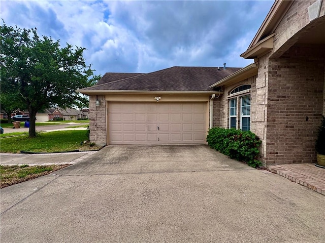 garage with driveway