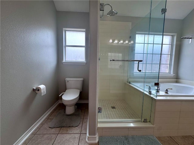 bathroom with tile patterned floors, a shower stall, toilet, and a bath