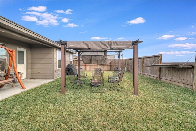 view of yard with a patio, a fire pit, and a pergola