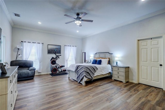 4409 Sue Cir, Corpus Christi, TX 78410 - bedroom featuring crown molding, wood finished floors, multiple windows, and visible vents